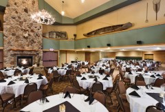 Large ballroom setup with round tables