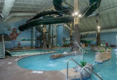 Large water slide with a lazy river beneath